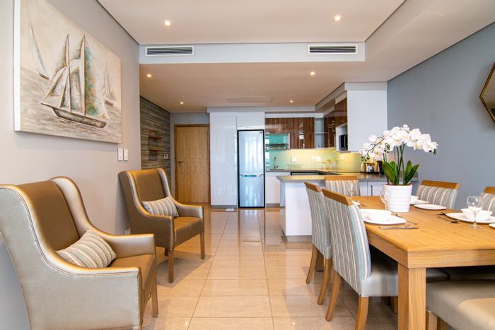 Umhlanga Rocks Central Apartment To Rent: 2-bed, balcony, security, beach access, WiFi included.