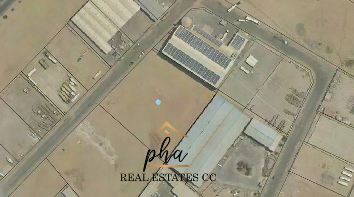 Industrial Land For Sale: 10,091m2, boundary walls, near weighbridge, accessible location.