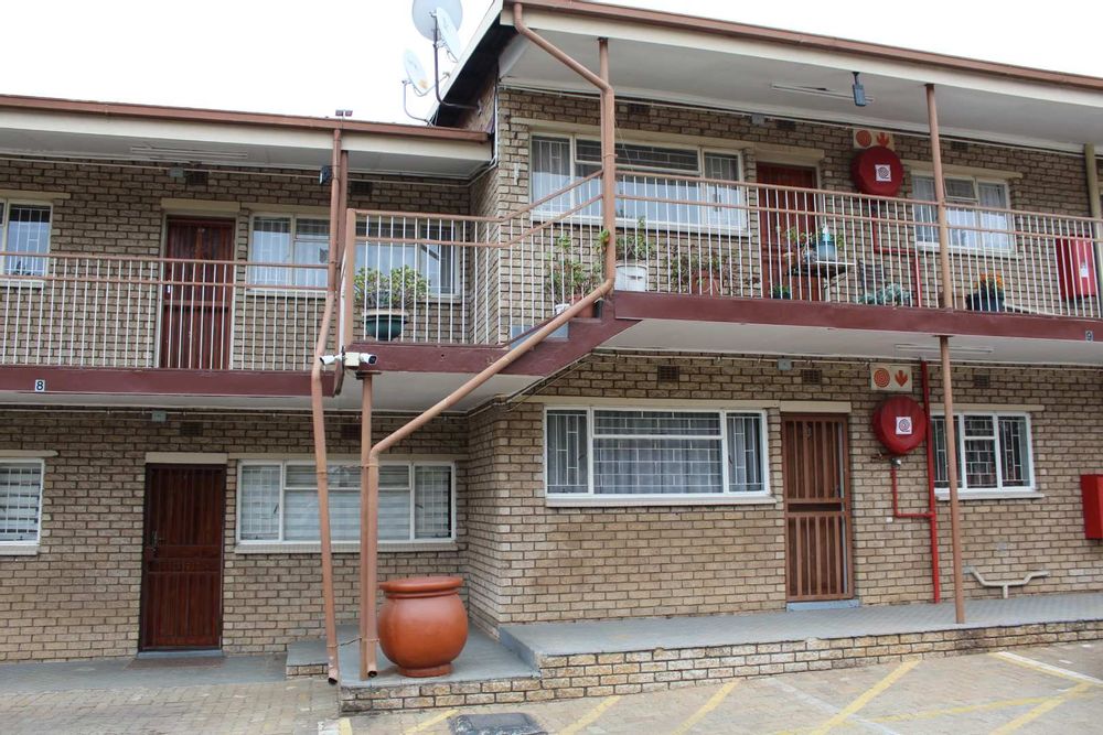 The unit front door on left ,ground floor.