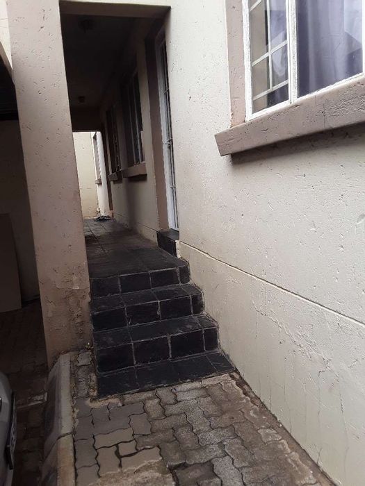 Townhouse for Sale in Elspark Ext 4: 3 bedrooms, security, parking, and convenience.