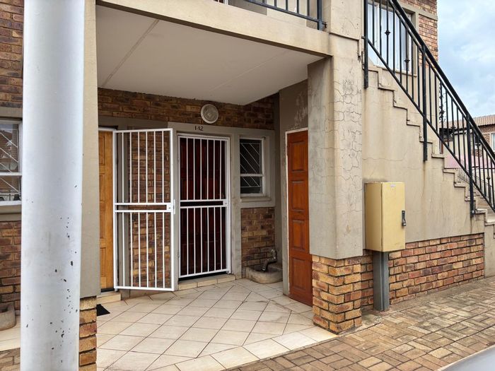 For Sale: Townhouse in Protea Glen Ext 11 with 24-hour security and play areas.