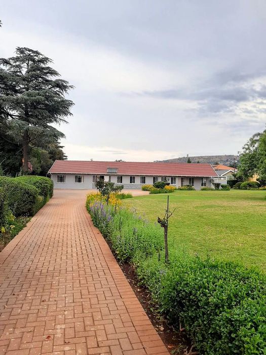 For Sale: Guest House in Fairland with 8 bedrooms, expansive grounds, and income potential.