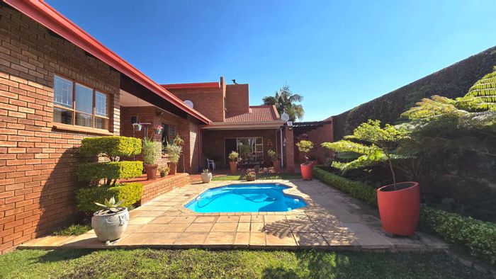 For Sale: Spacious Magalieskruin house with pool, garden, and ample parking.