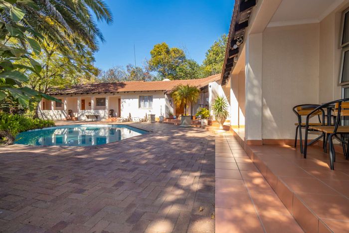 For Sale: Fourways House with 11 en-suite rooms, pool, and development potential.