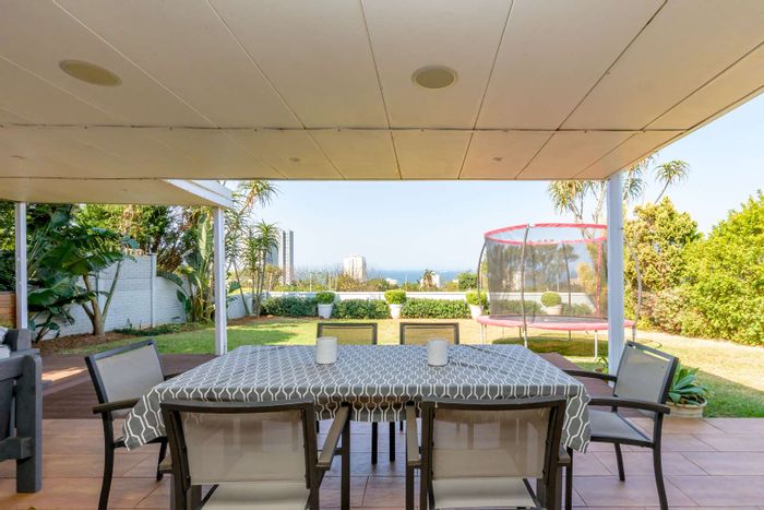 For Sale: Townhouse in Umhlanga Central with garden, pool, and ample parking.