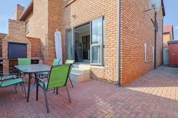 Townhouse For Sale in Florentia: 2 beds, private garden, secure complex amenities.