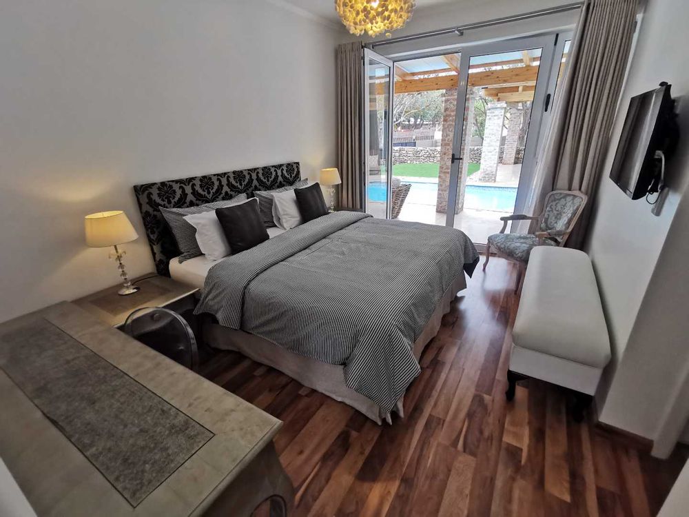 GROUND FLOOR - ONE OF THE 3 BEDROOMS 