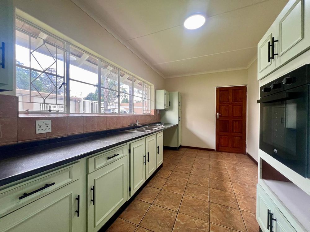 Large galley style kitchen