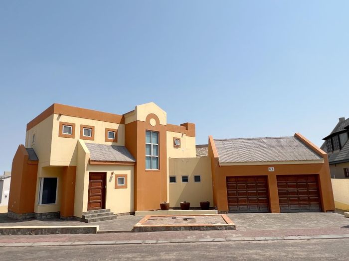 For Sale: Long Beach House with 4 Bedrooms, Indoor BBQ, and Double Garage.