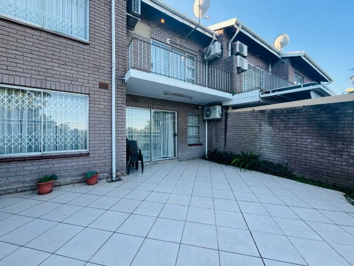 For Sale: 3-Bedroom Townhouse in Umgeni Park with security, garage, and patio.