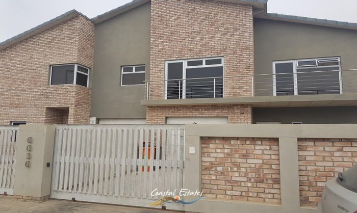 For Sale: Dual-residence house in Swakopmund Ext 19 with garages and BBQ areas.