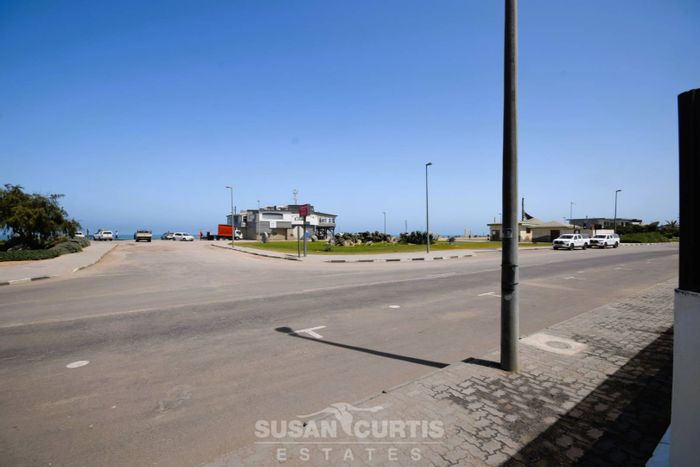 City Centre Apartment For Sale: 2 Bedrooms, sea views, garage, and courtyard.
