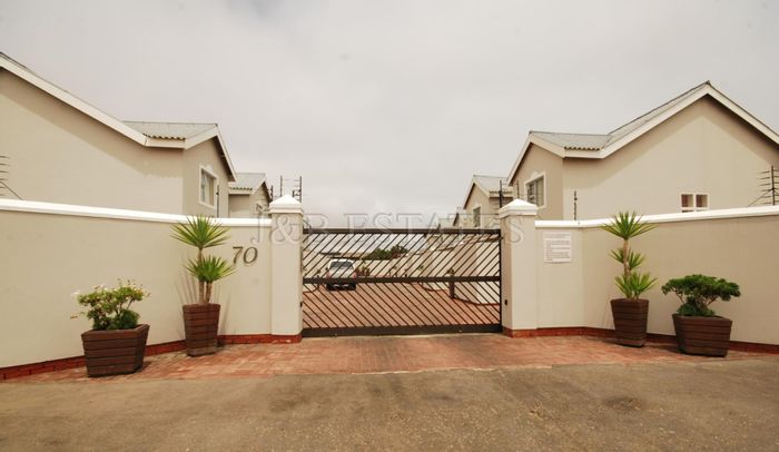 For Sale: 3-bedroom townhouse in Walvis Bay Central, close to schools and shops.