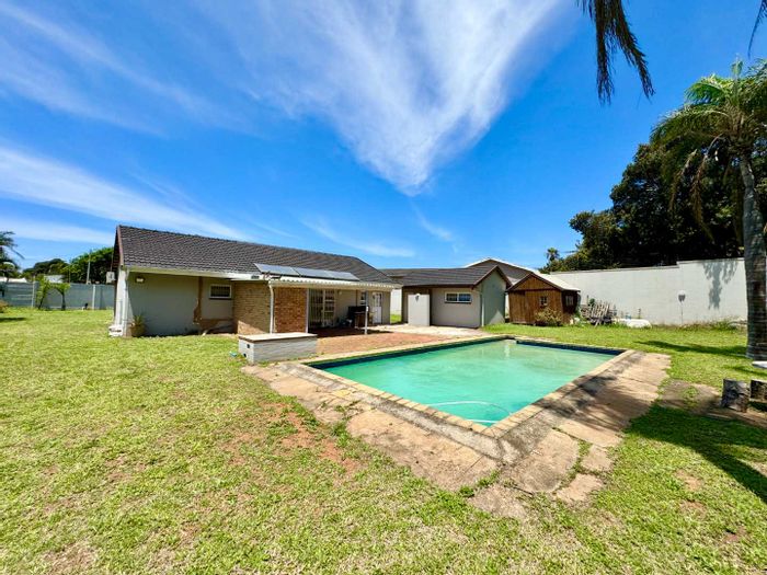 For Sale: House in Umhlanga Rocks Central with pool, garden, and staff quarters.