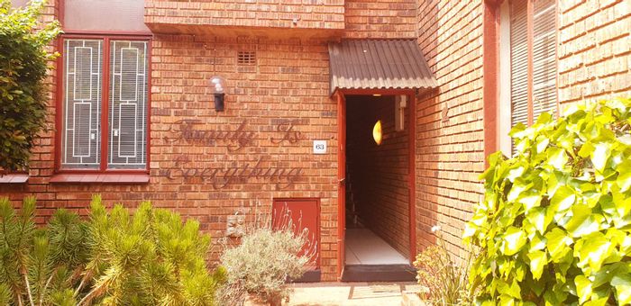 For Sale: Cluster in The Hill with garden, pool, 2 beds, 2 baths.
