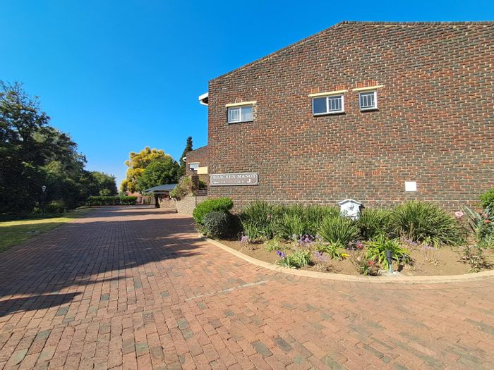 For Sale: Townhouse in Brackenhurst with 3 bedrooms, garden, and double garages.