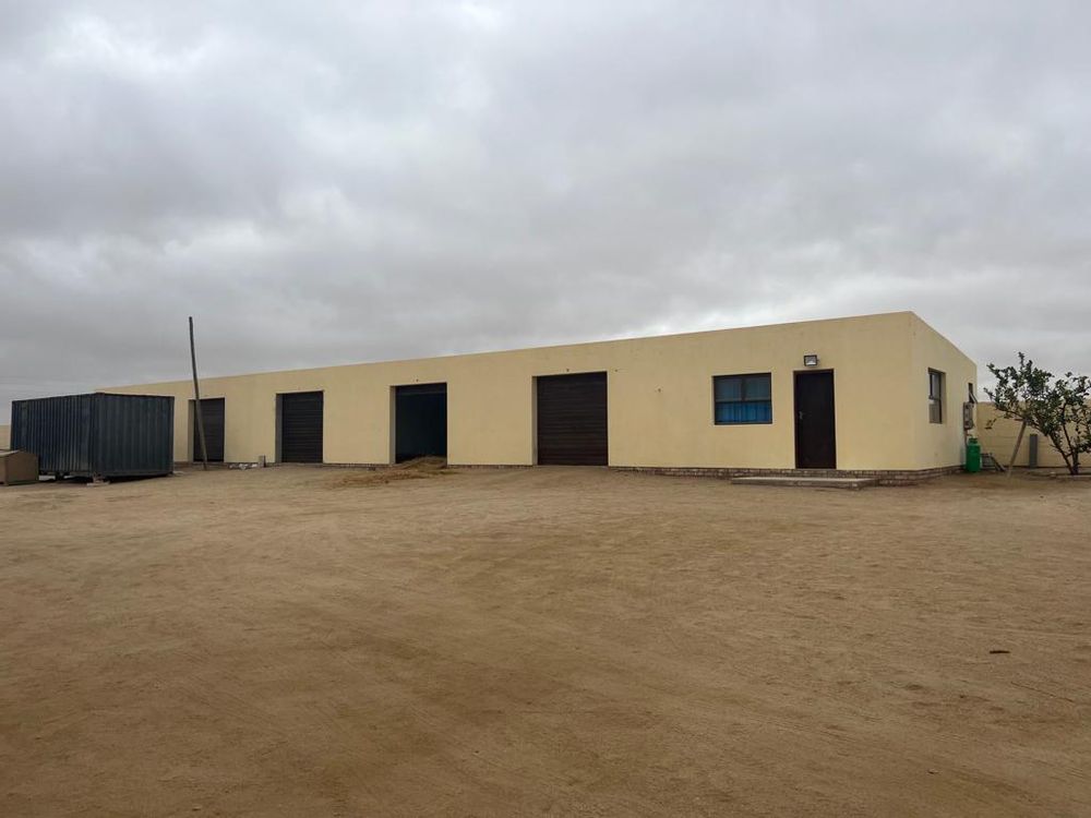 Garages, workers rooms and flat 2