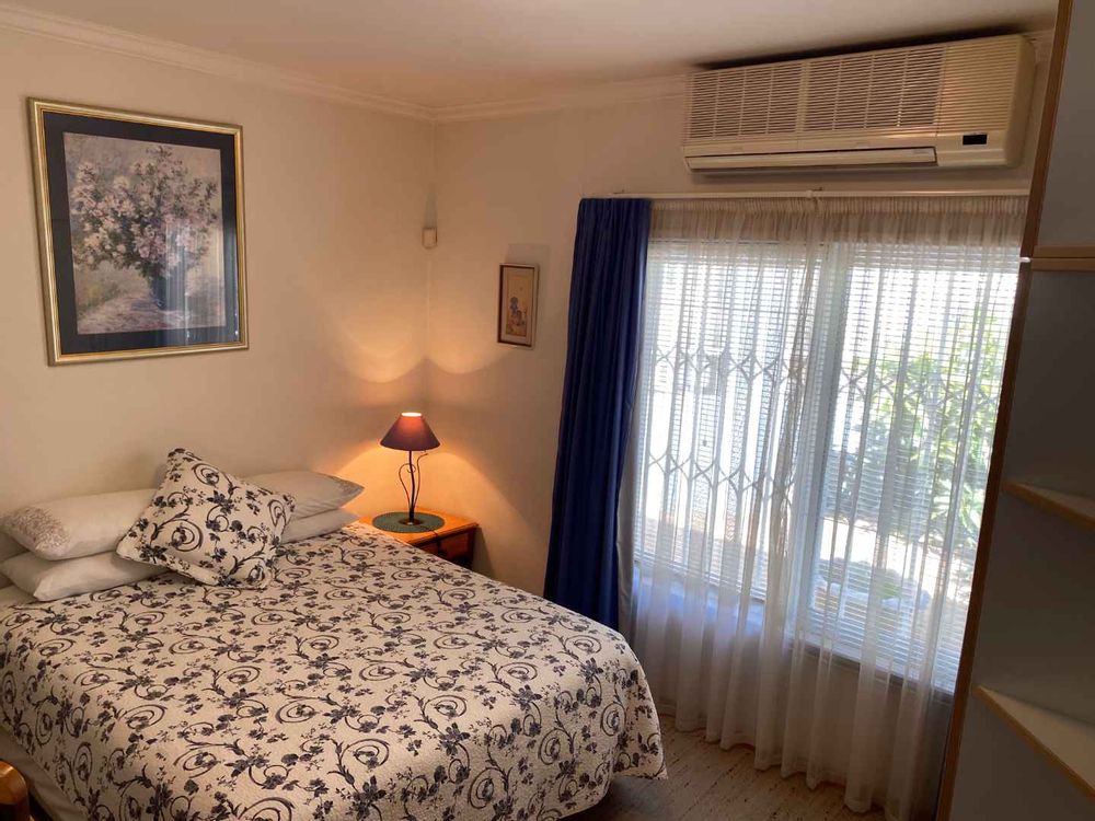 First of the extra bedrooms, well-sized with built-in cupboards