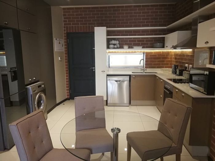 2-Bedroom Apartment To Rent in Rosebank, near Mall and Gautrain, with parking.
