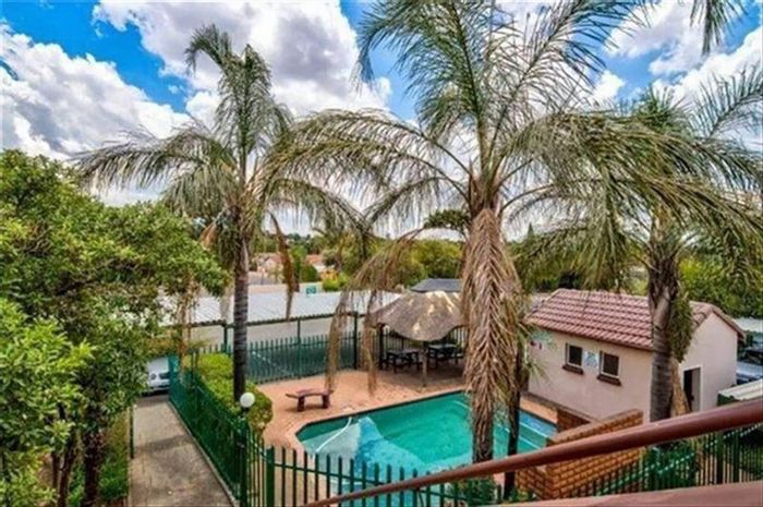 For Sale: Apartment in Norkem Park with pool, braai area, and schools nearby.