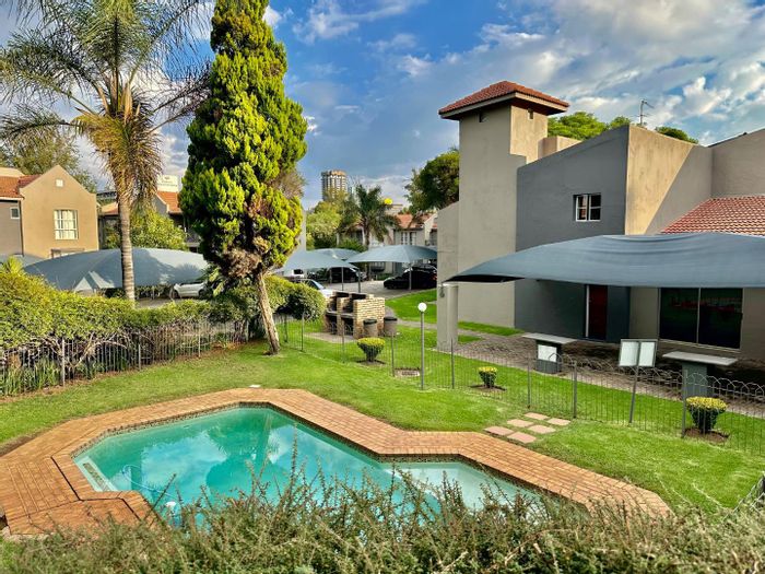 For Sale: Melville Apartment with pool, gym, and Airbnb potential.