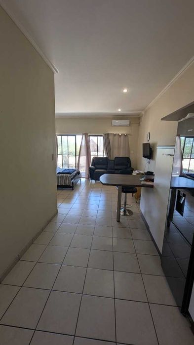 For Sale: Apartment in Windhoek West with pool, gym, and secure parking.