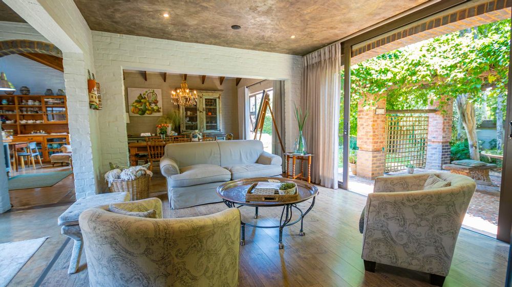 Family and TV room, widely opens to outside