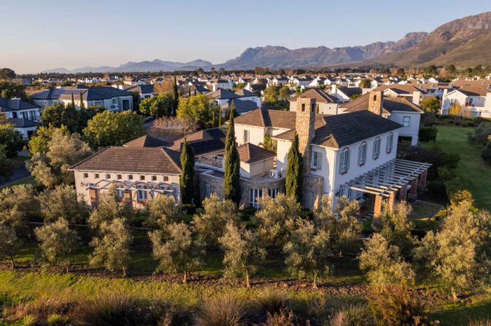 House for Sale in Val De Vie Estate: 4 beds, solar panels, mountain views.