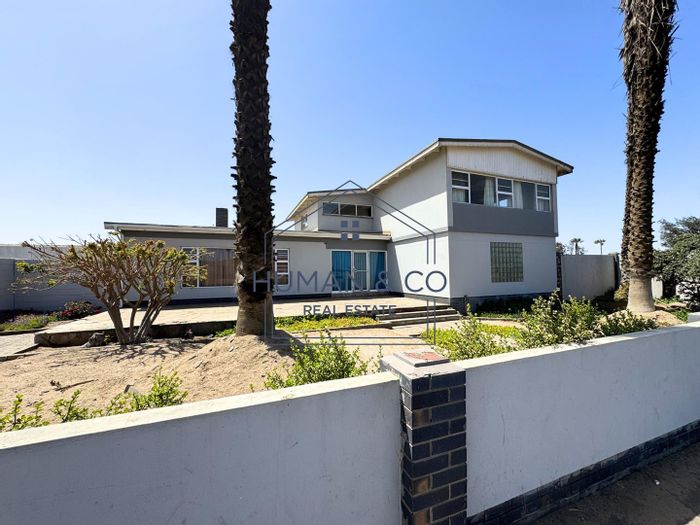 For Sale: Versatile 4-bedroom house with flatlet and 3 garages in Walvis Bay Central.