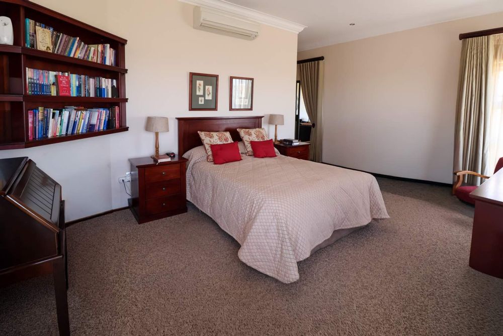 Main bedroom with separate dressing area in mahogany veneer