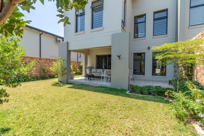 For Sale: Stylish Kyalami Apartment with Double Volume Entrance, Landscaped Garden & Covered Patio