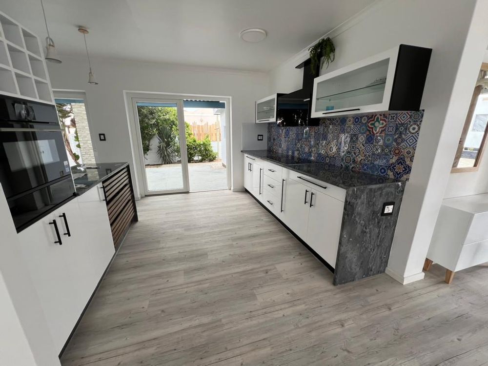 Kitchen and doors leading to patio