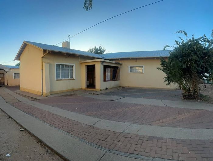 For Sale: House in Windhoek North with income-generating flats and spacious layout.