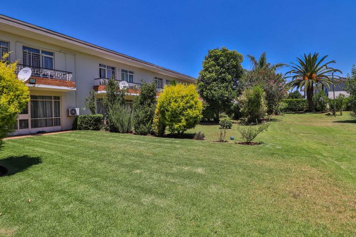 Townhouse for Sale in Benoni Central: 2-bed unit, garden, garage, versatile outdoor room.