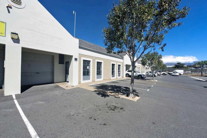 Industrial unit in Montague Gardens to rent with office, parking, and security.