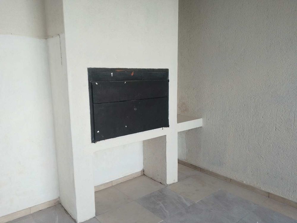 Close-up view of the braai installation in the braai room. 