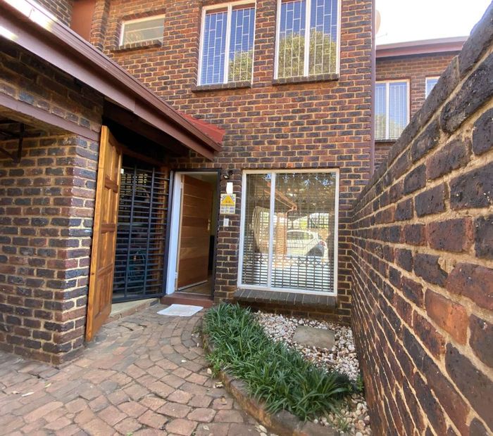 For Sale: 2-Bedroom Townhouse in Pierre Van Ryneveld with private garden and garage.