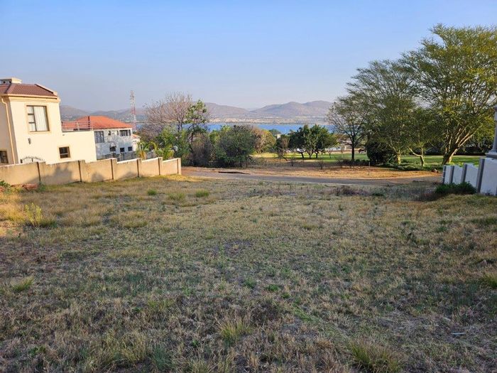 Vacant Land Residential For Sale in Kosmos Ridge with mountain views and boundary walls.