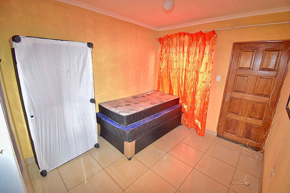 Living Area/ Lounge (Currently used as an additional bedroom)