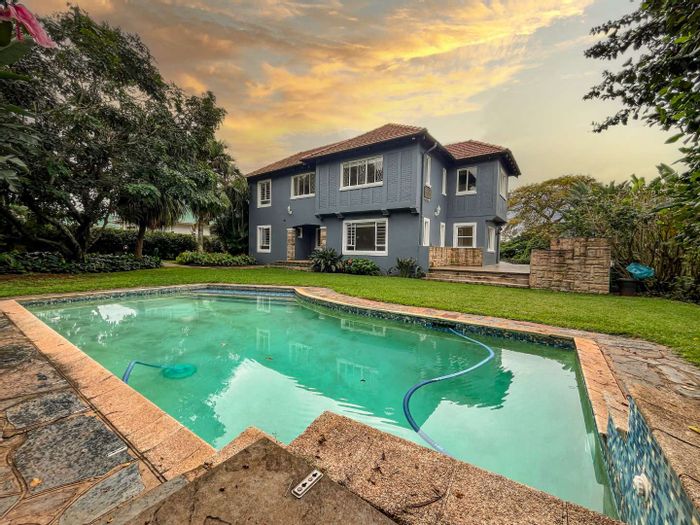 For Sale: Spacious 5-bedroom house with pool, cottage, and ample parking in Durban North Central.