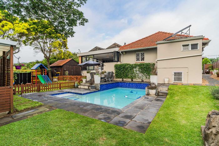 Durban North Central House For Sale: Versatile spaces, income flats, pool, and garden.