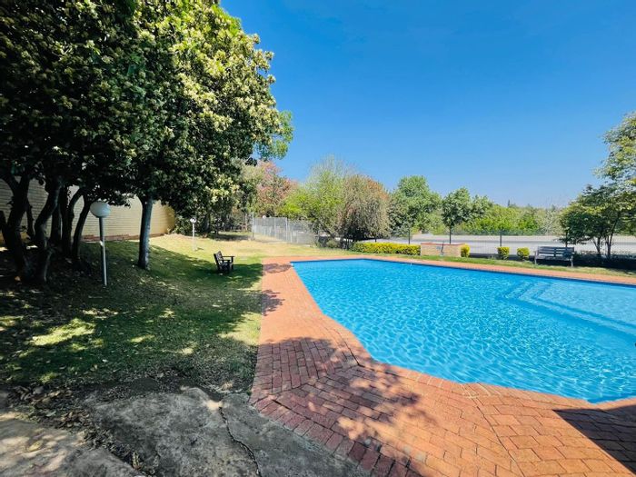 2-Bedroom Apartment To Rent in Sandhurst with balcony, garage, and pool access.