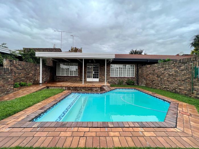 For Sale: Spacious Wilgers townhouse with pool, double garage, and security complex.