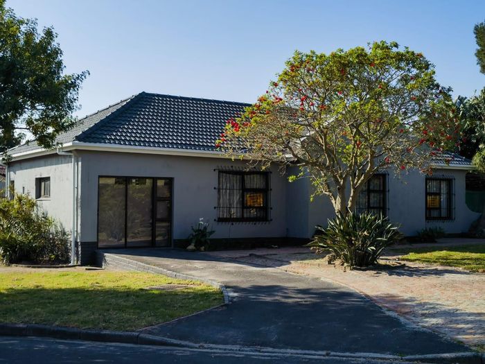 For Sale: Spacious 4-bedroom house in Kuils River Central with dual lounges and kitchenettes.