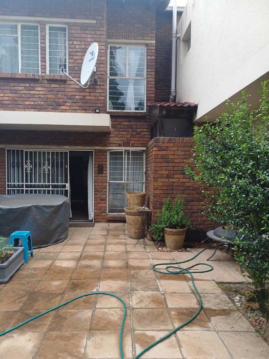 For Sale: 4-Bedroom Townhouse in Boksburg South with private garden and security.