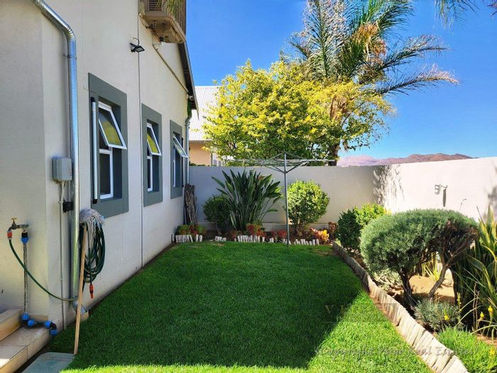 3 Bedroom Townhouse To Rent in Suiderhof with garden, study, and double garage.