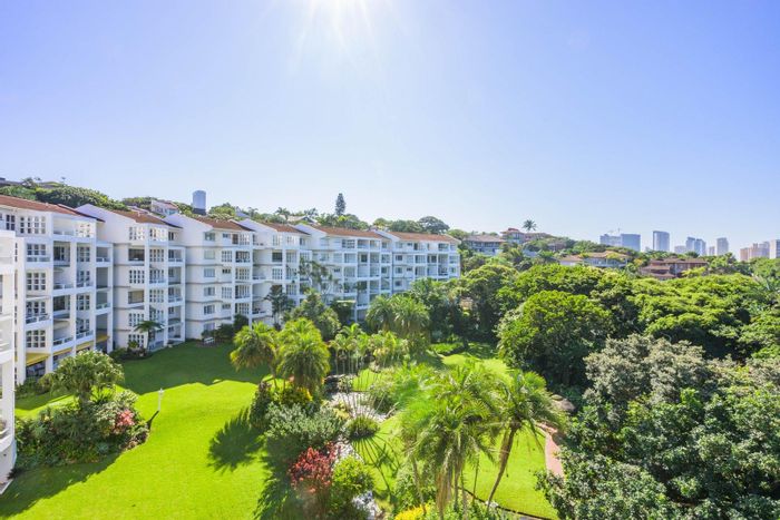For Sale: Apartment in Umhlanga Rocks Central with ocean views, private drive-up access.