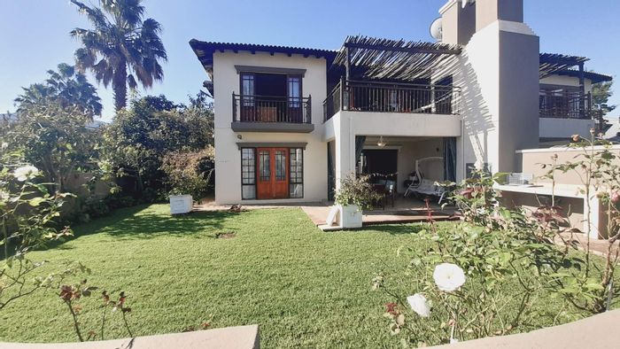 For Sale: Townhouse in Melodie with patio, garden, pool, and clubhouse access.