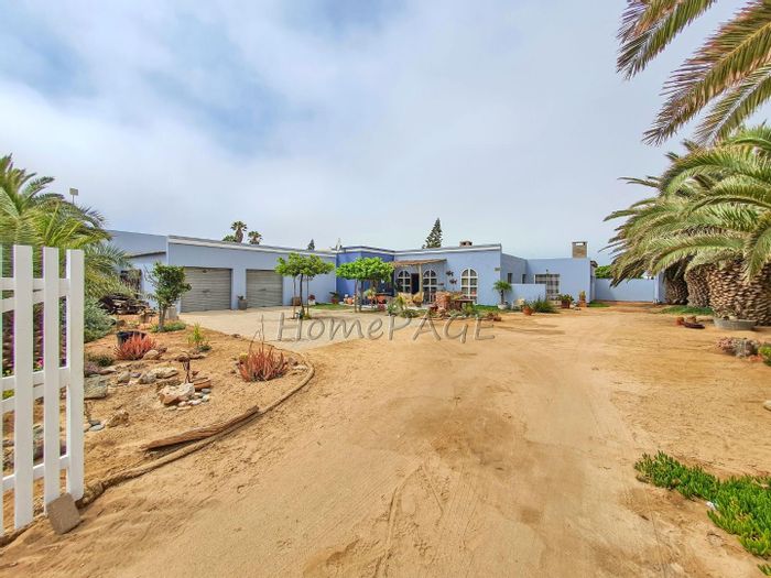 For Sale: Henties Bay Central House with 5 bedrooms, dual kitchens, and garage potential.