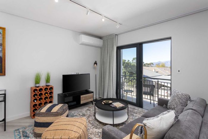 For Sale: 2-bedroom apartment in Paarl South with secure parking and storage.